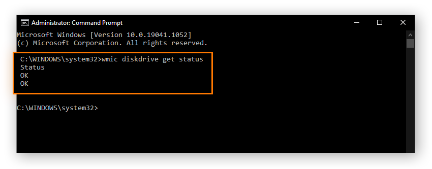 A screenshot of the SMART test results in command prompt; a line reading "OK" appears below the input, which is "wmic diskdrive get status."