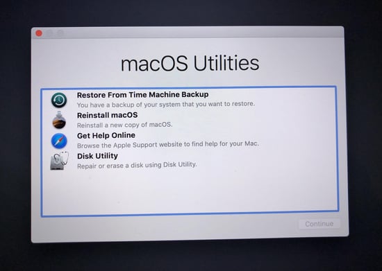 Running the macOS recovery environment to format hard disks.