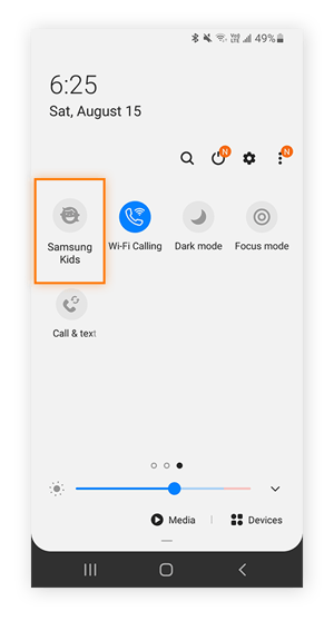 Samsung quick settings menu with Samsung Kids icon highlighted.