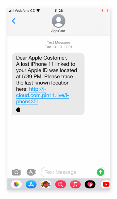 A spoofed text message for an Apple ID phishing scam
