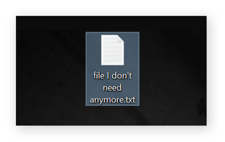 Un fichier portant le nom « Je n’en ai plus besoin » mis en surbrillance sur le Bureau