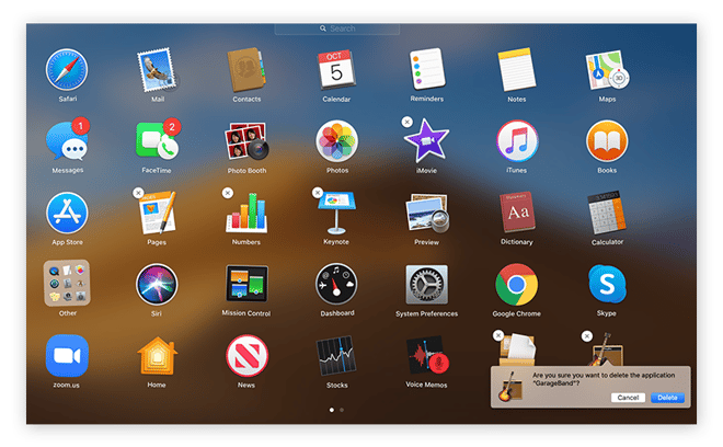 Captura de tela da visualização do Launchpad no Mac com o aplicativo Garage Band pronto para exclusão com solicitação de confirmação.
