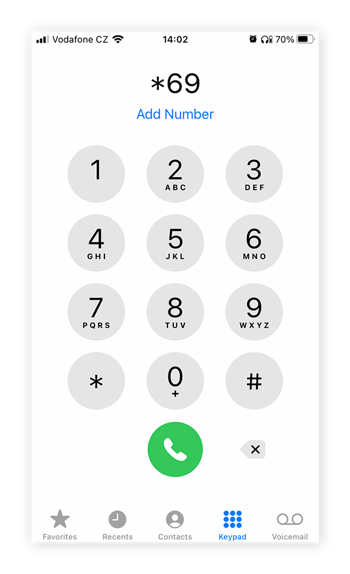 An iPhone keypad dialing *69 to activate the last-call return service.
