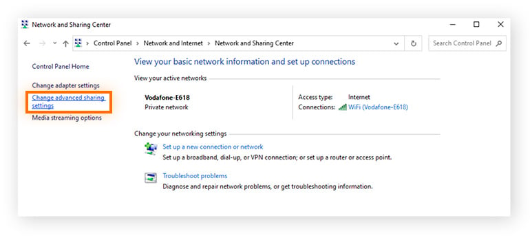 Highlighting 'Change advanced sharing settings' in the "Network and Sharing Center" screen