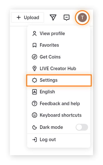 Opening TikTok account settings from a laptop.
