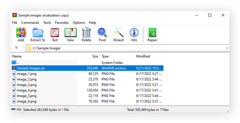 An open WinRAR window with a newly created .rar file highlighted.
