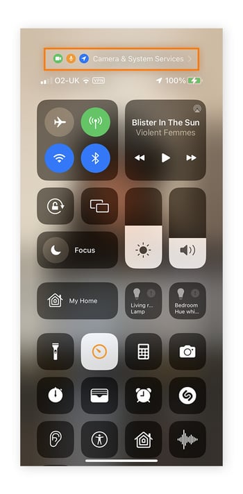 iPhone Control Centre with the privacy activity banner highlighted