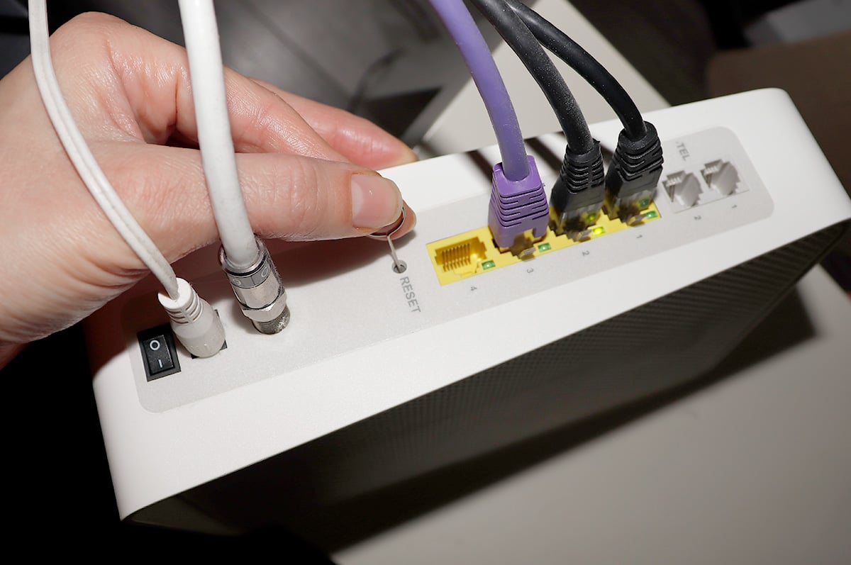 Resetting your router by pressing the reset button.