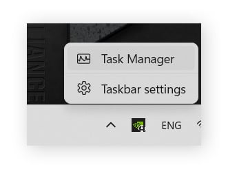 A user has right-clicked the taskbar and Task Manager is shown as a clickable option.