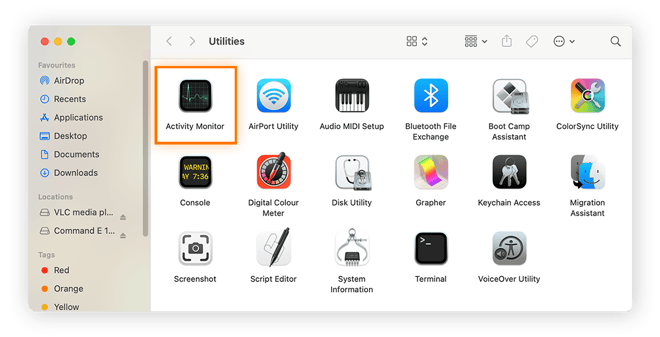 O menu Utilitários mostrando o aplicativo “Monitor de Atividade” selecionado.