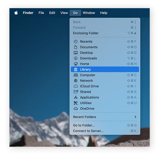 Selecting Library in the Go menu on macOS Sonoma.