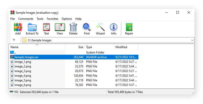 An open WinRAR window with a newly created .rar file highlighted.